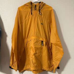 REI yellow windbreaker anorak with hood